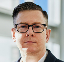 Alexander Hughes, CEO van een crypto trading bedrijf, headshot